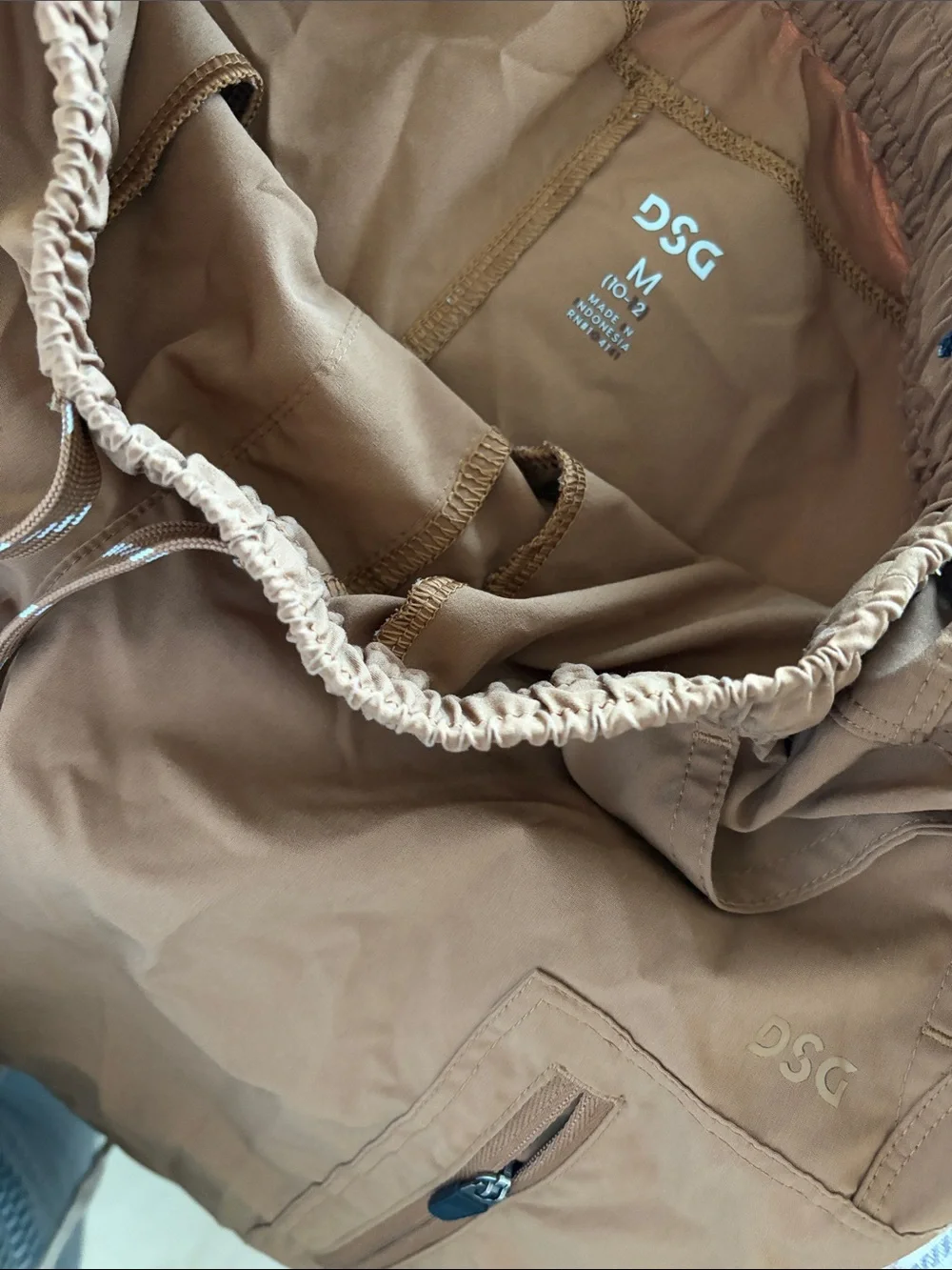 Nike Beige Pants with Light Blue Jeans and Brown Joggers